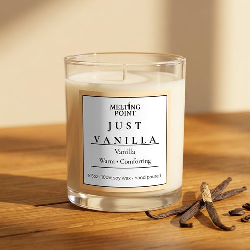Just Vanilla hand-poured soy candle with warm vanilla scent in a clear glass jar with vanilla beans