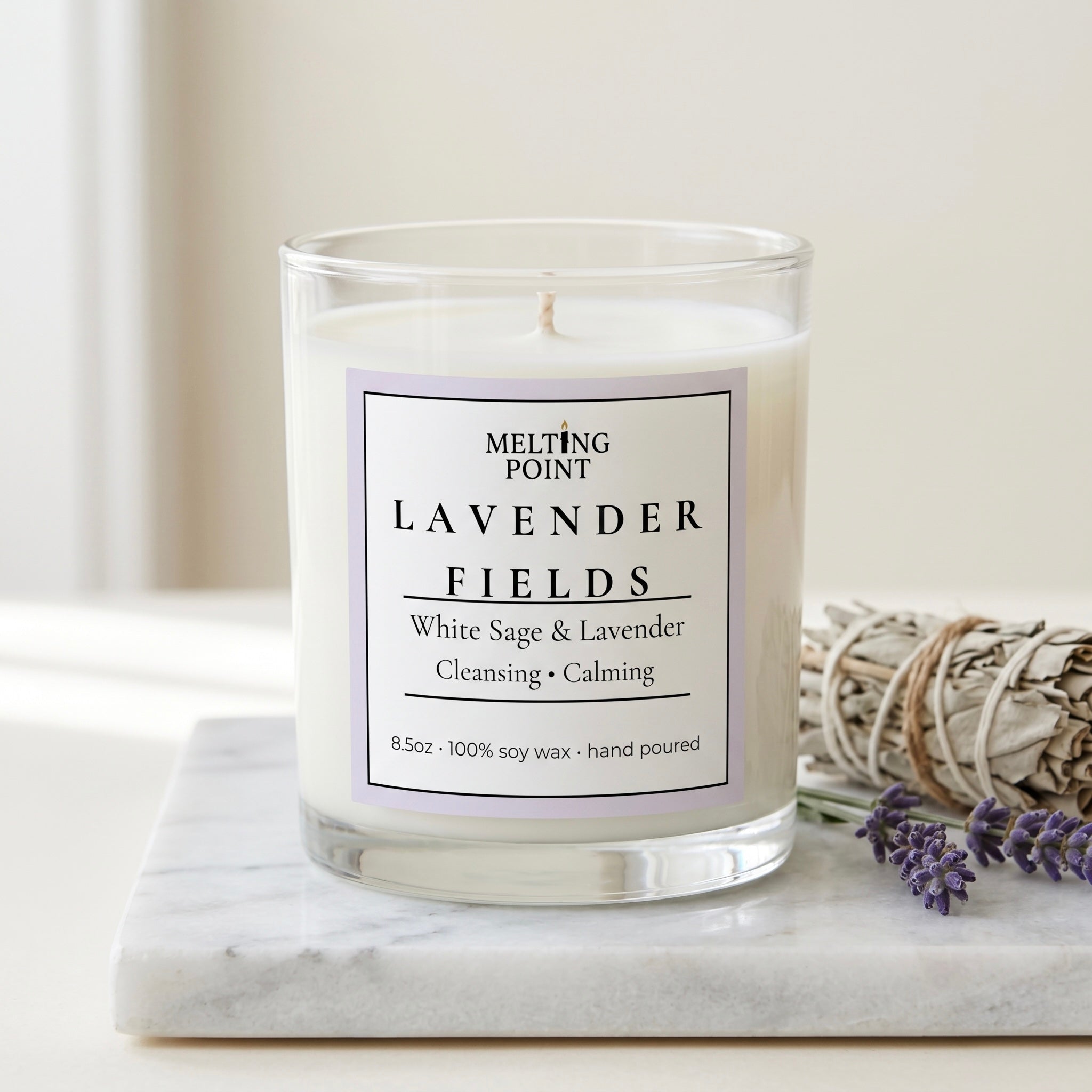 Lavender Fields hand-poured soy candle with calming lavender and white sage scent in a clear glass jar
